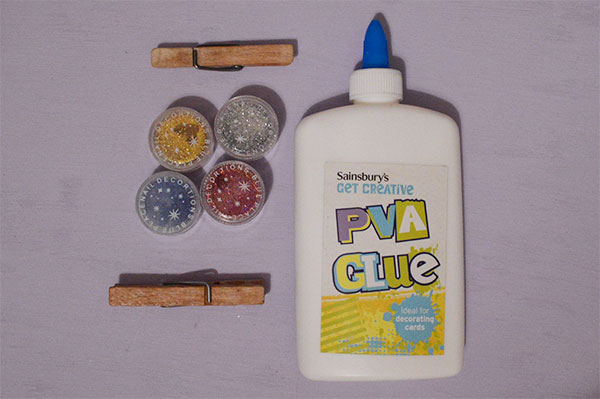 PVA glue, wooden pegs and glitter
